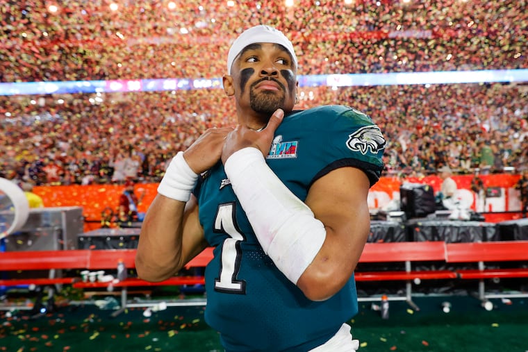 Eagles quarterback Jalen Hurts walks off the field after losing to the Kansas City Chiefs in Super Bowl LVII at State Farm Stadium on Sunday, February 12, 2023 in Glendale, AZ.