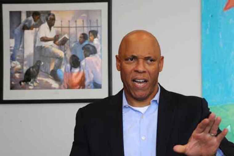 Philadelphia Schools Superintendent William Hite discusses the "doomsday" crisis facing the district in less than a month, that being opening schools without counselors, noon time aides, assistant principals, sports, music, etc. Photos taken in his office at district headquarters. The print in the background is titled Short Stories by Joseph Holston. ( CLEM MURRAY / Staff Photographer )
