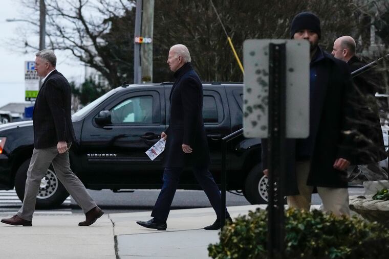 President Joe Biden walks from St. Edmund Roman Catholic Church after attending Mass in Rehoboth Beach, Del., Saturday.