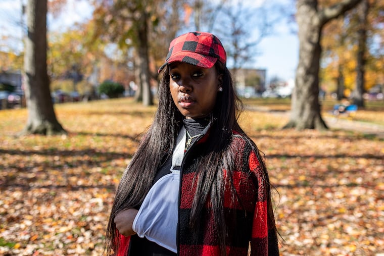 Rickia Young, 28, of North Philadelphia at Malcolm X Park in West Philadelphia on Nov. 14, 2020. Young, her 2-year-old son and 16-year-old nephew were driving home when she encountered police from a night of protests. The city said Monday it settled with her for $2 million.