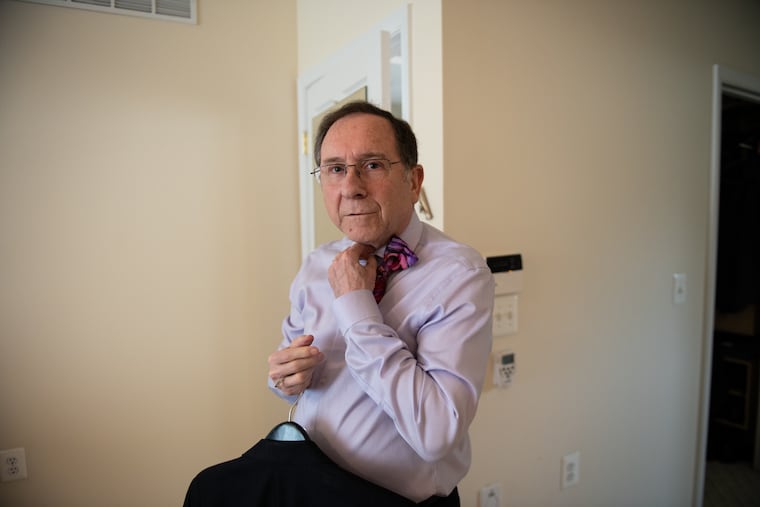 Glenn “Hurricane” Schwartz looks over his bow tie collection as he prepares to go to his job as a meteorologist at NBC10 in 2022. Schwartz retired after 27 years with the Philadelphia station.