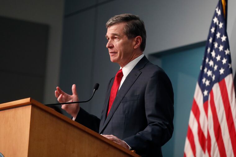 North Carolina Gov. Roy Cooper speaks during a briefing at the Emergency Operations Center in Raleigh.
