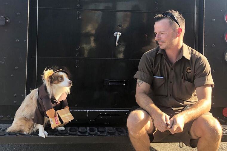 This photo is of UPS driver Noah, who makes a daily run, and Rick, the dog who always greets him at the door, said Luisa, the owner.