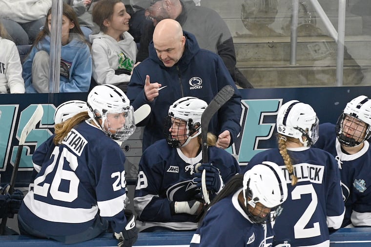 Penn State coach Jeff Kampersal gives instructions to his team during its Frozen Four game against Wisconsin.