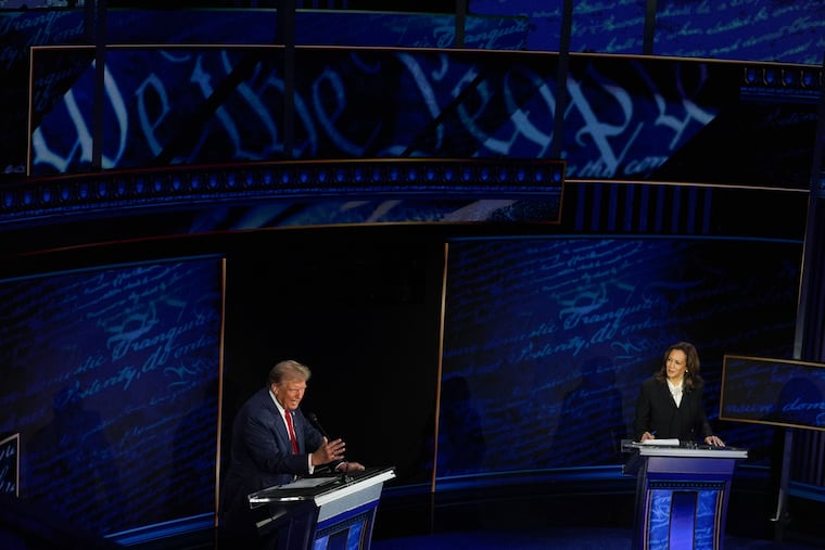 Donald Trump and Vice President Kamala Harris debate Tuesday in Philadelphia. (MUST CREDIT: Demetrius Freeman/The Washington Post)