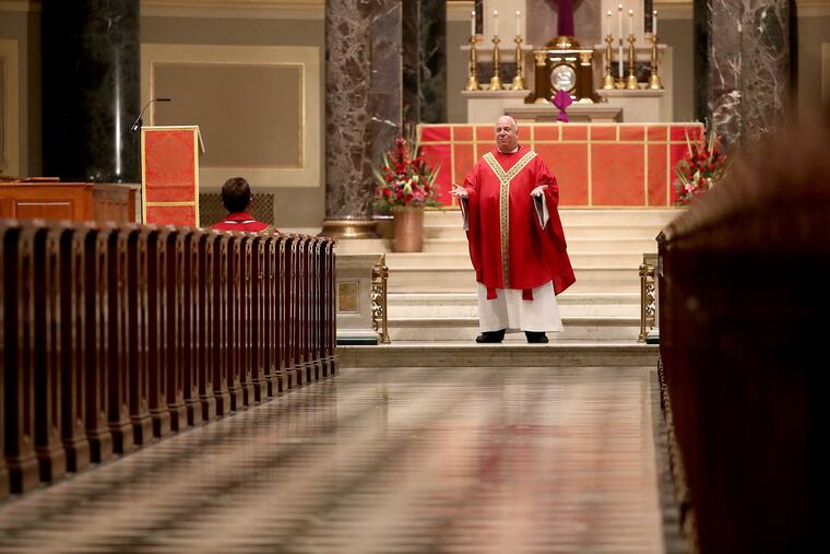 Archbishop Nelson Pérez gives his homily during Palm Sunday mass that was closed to the public at Cathedral Basilica of Saints Peter & Paul in Philadelphia, PA on April 5, 2020.