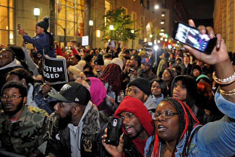 Supporters call for justice for imprisoned rapper Meek Mill during a rally outside the Criminal Justice Center November 13, 2017.