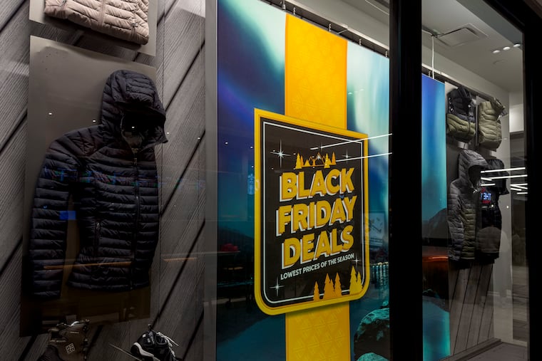 Columbia Black Friday Deals signs at the Fashion District in Philadelphia, Pa., on Tuesday Nov. 15, 2022.