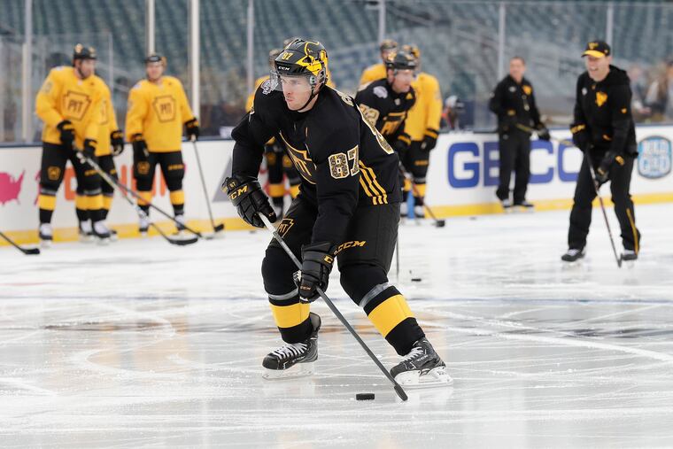 Pittsburgh Penguins center Sidney Crosby skates with the puck during practice at Lincoln Financial Field on Friday, February 22, 2019. The Penguins will take on the Flyers tomorrow night in the Stadium Series game.