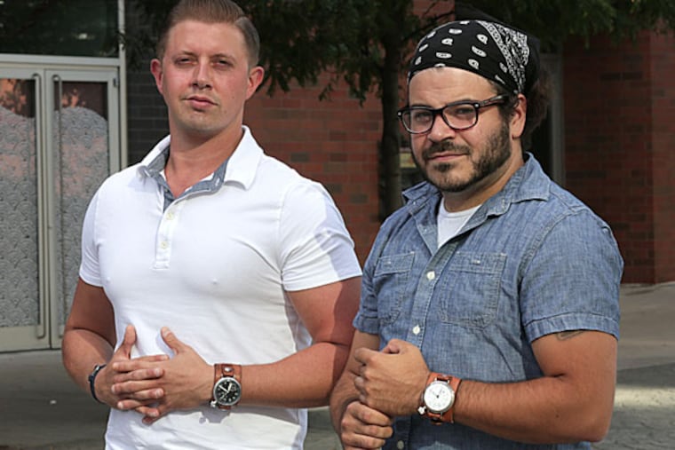 Adam Feld, left, and Tom Lovelund owners of DoughBoy watches. The owners are Philly guys who started the company four years ago and have expanded into making one-of-a-kind leather straps that they hand dye. ( Kevin Cook / For the Inquirer )