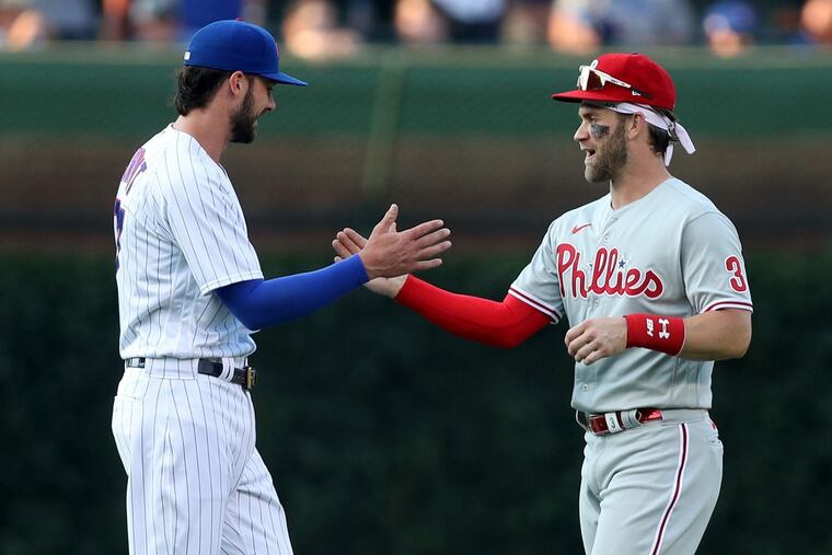 Could a reunion of former childhood teammates Kris Bryant, left, and Bryce Harper be in the cards for the Phillies this winter?