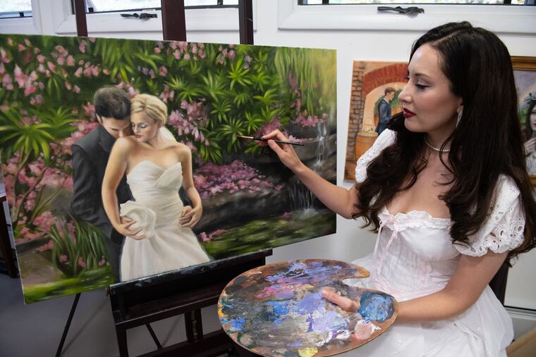 In her Wayne home studio, artist Jessica Libor demonstrates how she works as a live-event painter at weddings..