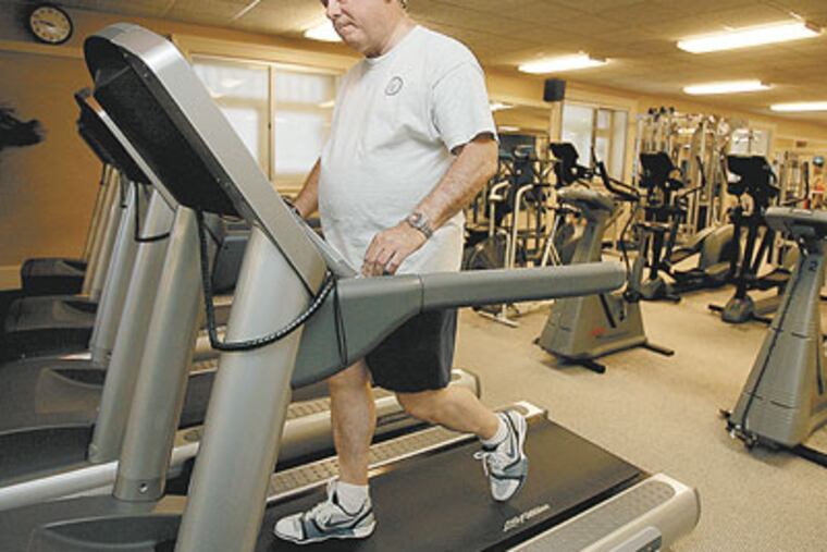 Frank Giordano works out at the Union League. (Akira Suwa / Staff Photographer)