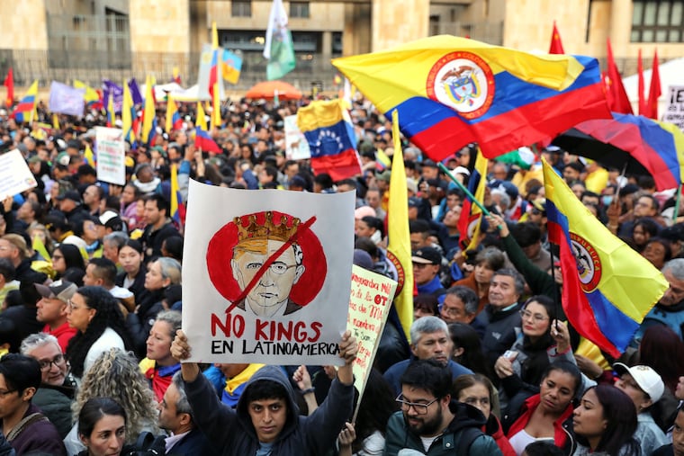 Supporters of Colombian President Gustavo Petro attend a rally in Bogota on Wednesday that he called to protest comments by President Donald Trump.