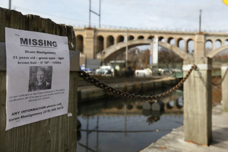 A poster for missing student Shane Montgomery posted along the Manayunk canal.