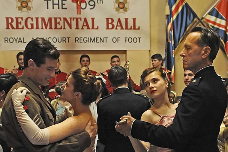 "Queen & Country": Callum Turner (Bill Rohan) dancing with Aimee-Ffion Edwards (Sophie Adams) and Miriam Rizea (Peggy) dancing with Richard E. Grant (Major Cross). (Photo: ©Sophie Mutevelian)