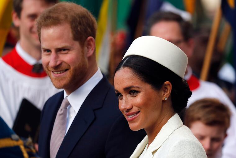 FILE - In this Monday, March 11, 2019 file photo, Britain's Prince Harry and Meghan, the Duchess of Sussex leave after the Commonwealth Service at Westminster Abbey in London. Prince Harry and Meghan Markle are to no longer use their HRH titles and will repay £2.4 million of taxpayer's money spent on renovating their Berkshire home, Buckingham Palace announced Saturday, Jan. 18. 2020.