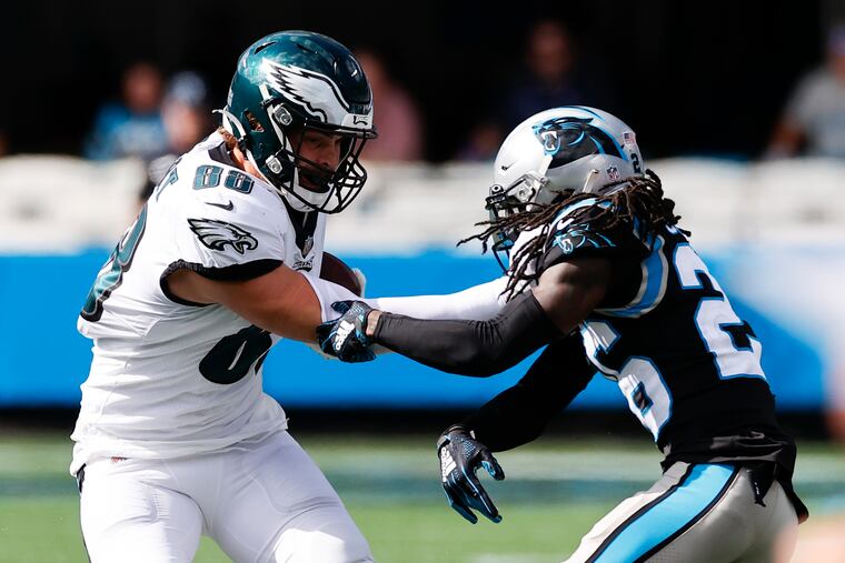 Eagles tight end Dallas Goedert shoves Carolina Panthers cornerback Donte Jackson during the third quarter on Sunday, October 10, 2021 in Charlotte.