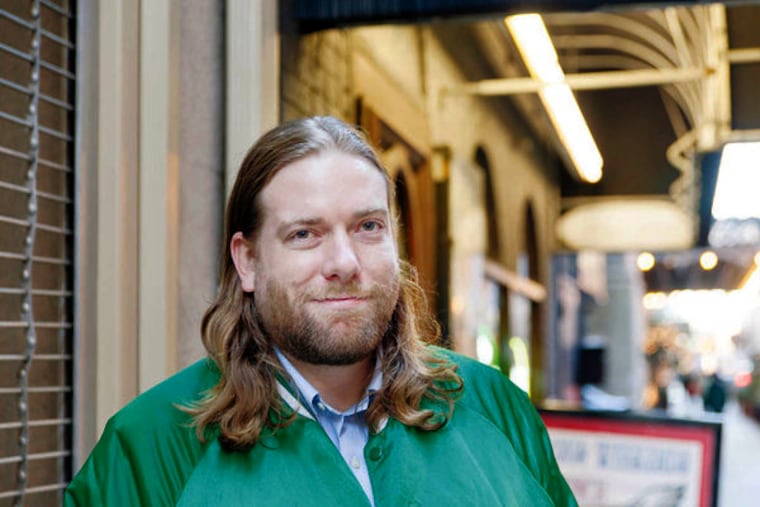 Dan McQuade, whose YouTube video of comedian Hannibal Buress at the Trocadero Theater led to the international firestorm of Bill Cosby, chills at his local watering hole, Locust Rendezvous Bar & Grill in downtown Philadelphia. (Chanda Jones/Staff photographer)