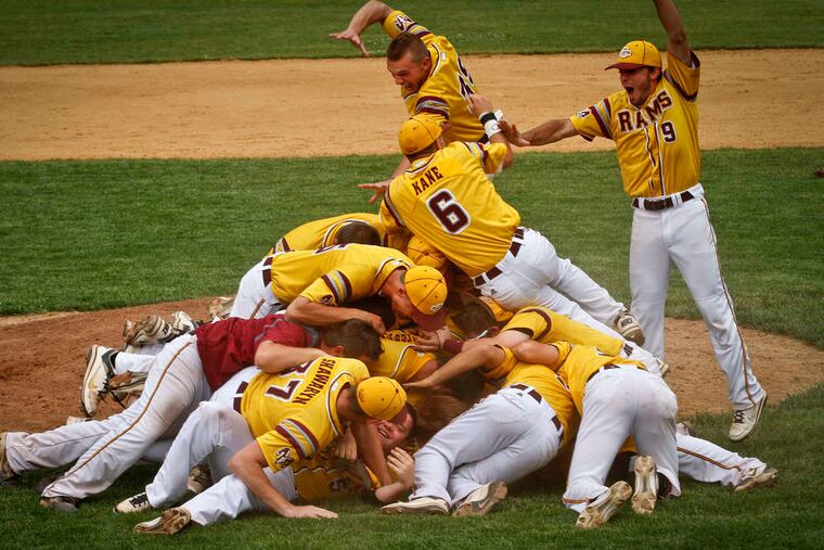 Gloucester Catholic players pile onto the mound after their 4-1 victory in the championship game.