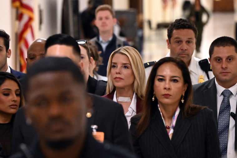 Former Attorney General Pam Bondi, center, arrives on Capitol Hill to deliver a deposition behind closed doors to the House Oversight Committee about the Jeffrey Epstein files on Friday morning, May 29, 2026.