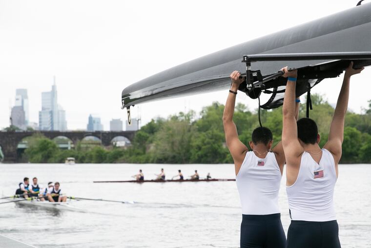 Rowers with the United States Merchant Marine Academy make their way to the launch dock on the first day of the 2022 Jefferson Dad Vail Regatta.