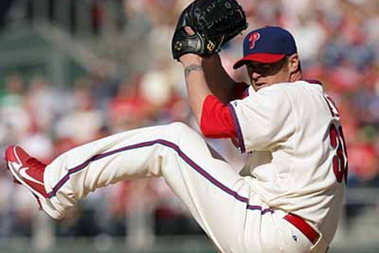 Phillies' pitcher Brett Myers sets and delivers. (Yong Kim / Staff Photographer)