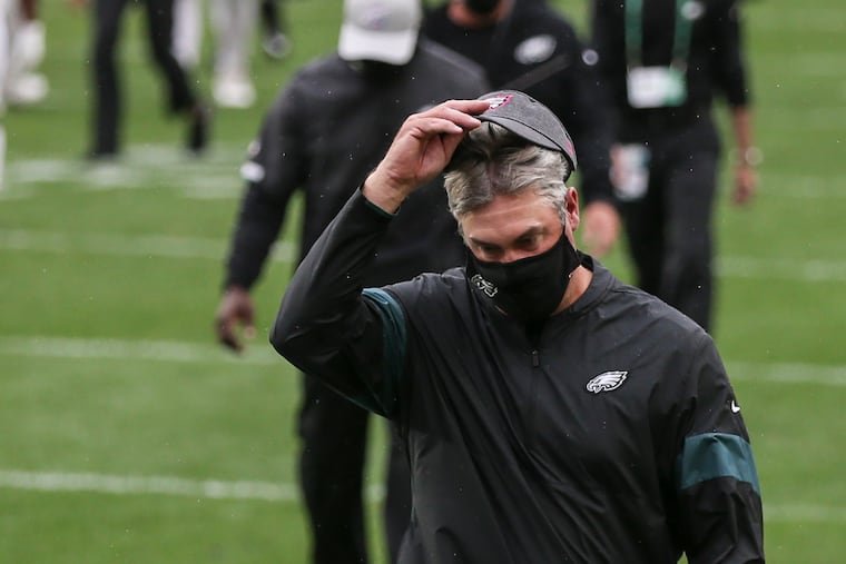 Eagles coach Doug Pederson walks off the field after the 38-29 loss to the Steelers.