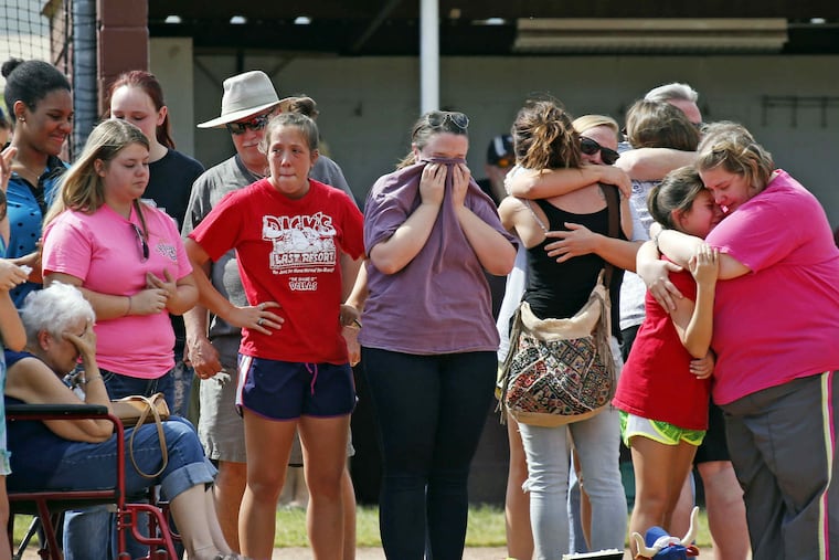 Family and friends mourn at vigil for Meagan Richardson, one of four North Central Texas College softball players who died in bus crash on Friday night.