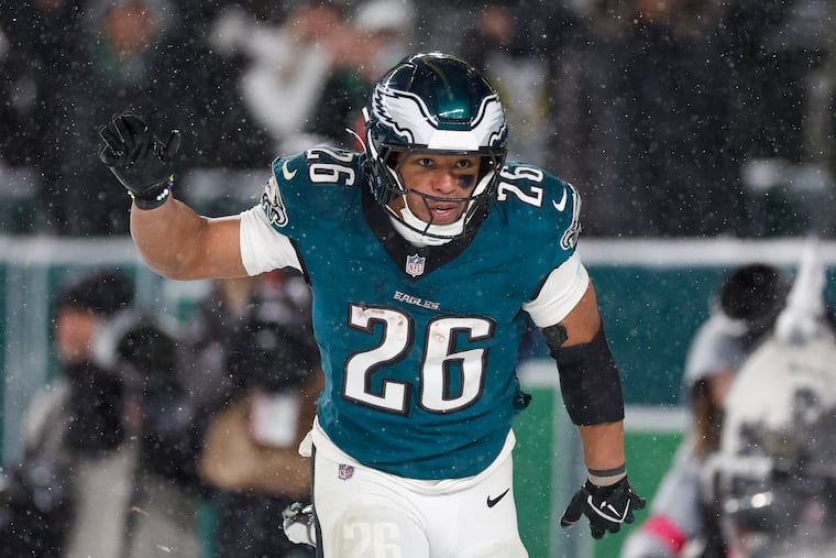 Saquon Barkley ran through the snow for 205 yards and two touchdowns against the Rams.