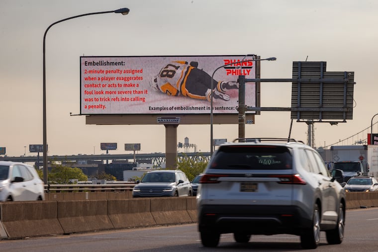 A Phans of Philly billboard visible from northbound I-95 near the stadiums pokes fun at Sidney Crosby's flop in Game 3.