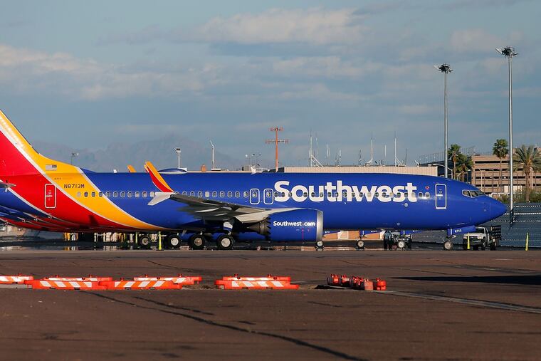 A group of Southwest Airlines Boeing 737 MAX 8 aircraft sit on the tarmac at Phoenix Sky Harbor International Airport on March 13, 2019 in Phoenix, Arizona. The United States has followed countries around the world and has grounded all Boeing 737 Max 8 aircraft following the crash of an Ethiopia Airlines 737 Max 8. (Photo by Ralph Freso/Getty Images/TNS)