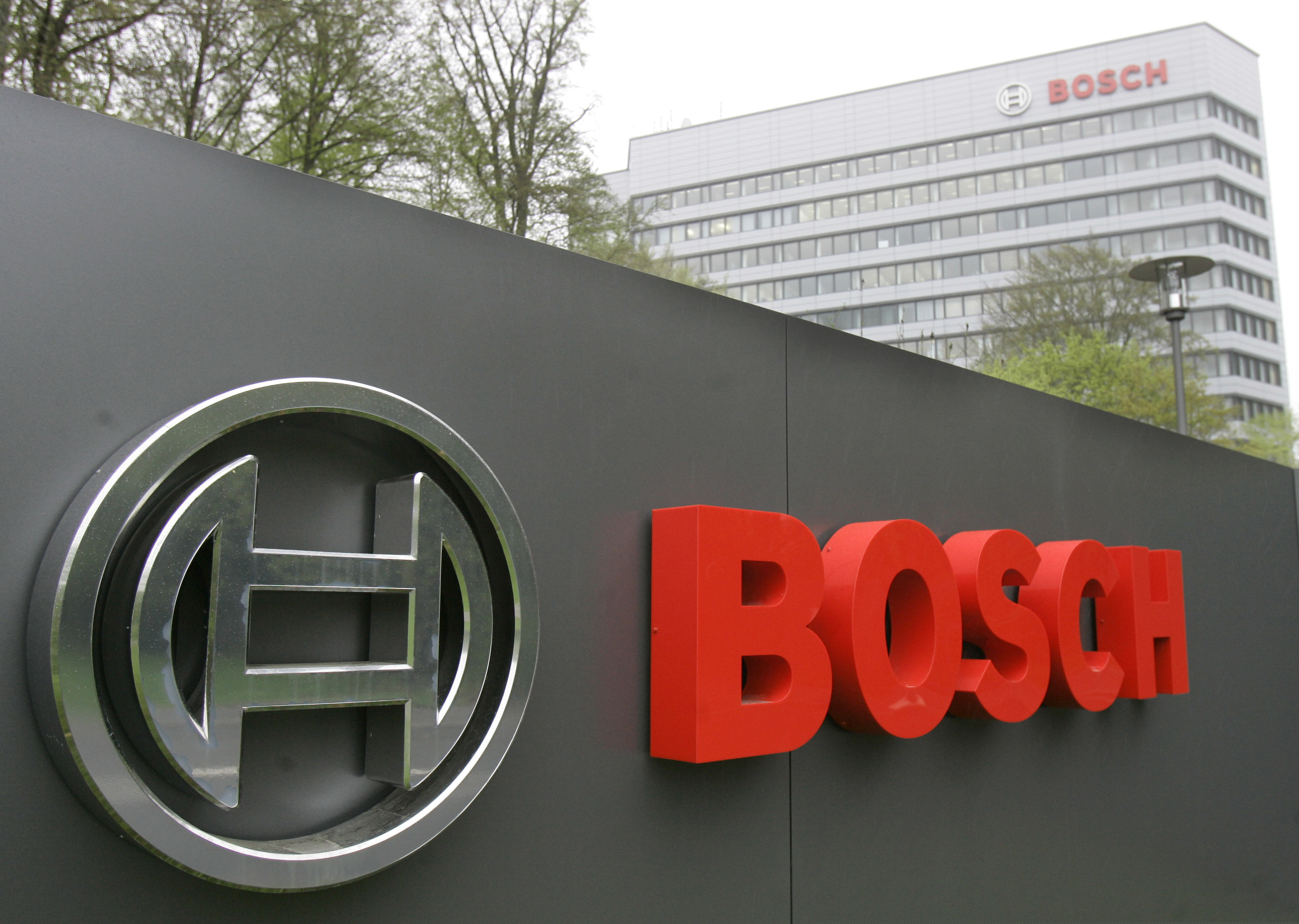 FILE In this April 27, 2006, file photo, the logo of the Robert Bosch GmbH in front of the company's headquarters in Gerlingen near Stuttgart, southwestern Germany. German prosecutors have fined auto components and technology company Robert Bosch GmbH 90 million euros ($100 million) over its role in the diesel emissions scandal that erupted at Volkswagen in 2015.
