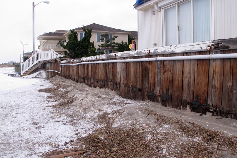 This Jan. 14, 2015 photo shows oceanfront homes in Margate N.J. behind a protective bulkhead that the town considers sufficient to protect against coastal storms.