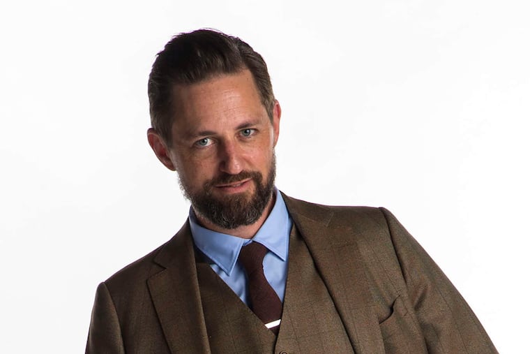 James Zeleniak of Punch Media wears his own custom three-piece suit courtesy of Henry A. Davidsen. CLEM MURRAY / Staff Photographer