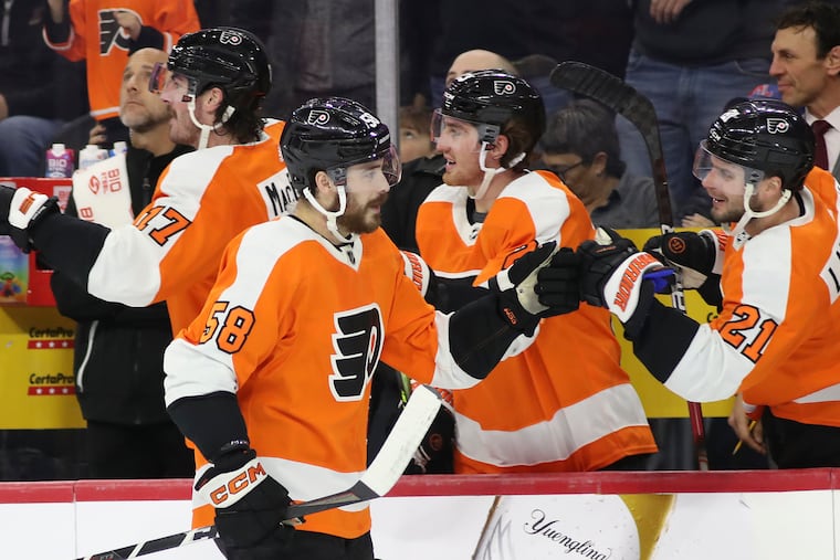 Flyers center Tanner Laczynski celebrates his first period goal with his teammates against the Colorado Avalanche on Monday, December 5, 2022 in Philadelphia.