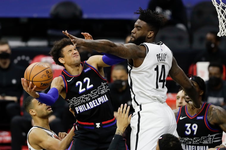 Sixers guard Matisse Thybulle getting fouled by Brooklyn Nets forward Norvel Pelle on Feb. 6.