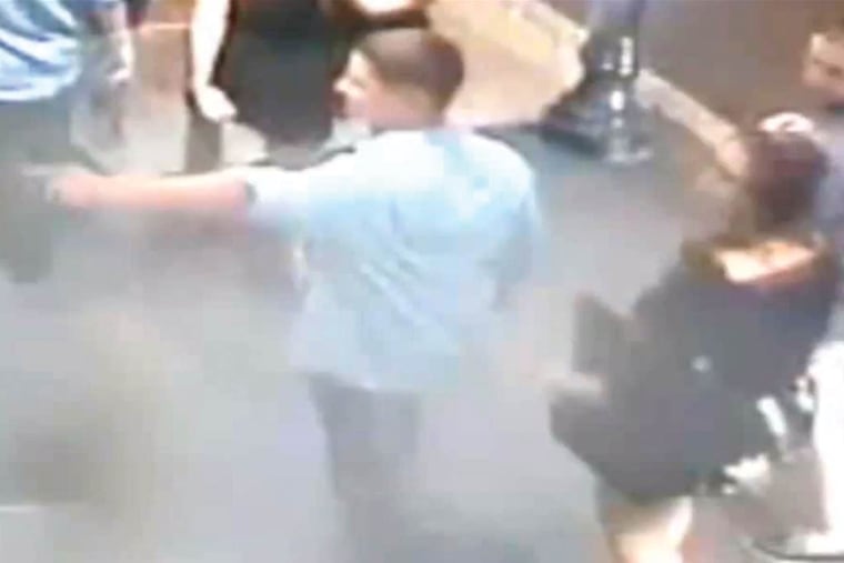 Screenshot: Philadelphia police released surveillance video of up to 12 people it identified as suspects walking through Center City near the time of a fight with two gay men.
