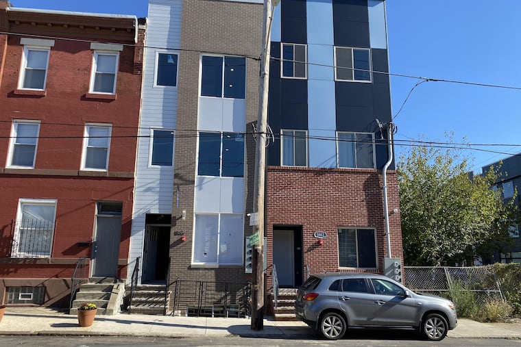 A 5-year-old girl was shot inside a residence on the 1800 block of North Sixth Street in North Philadelphia on Tuesday night, Nov. 3, 2020 ,police said. She is in stable condition at Temple University Hospital. Neighbors on the block said the girl lives with her parents in the second-floor apartment of the newly constructed apartment building in the right of this photo, taken Wednesday, Nov. 4, 2020.