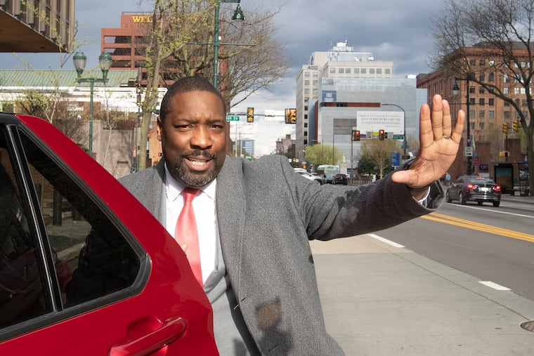 City Councilmember Kenyatta Johnson leaves the courthouse after a mistrial was declared.