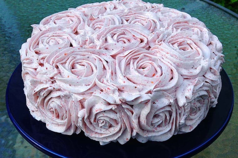 Aquafaba-based Vegan Vanilla Cake with aquafaba-based Strawberry Buttercream.