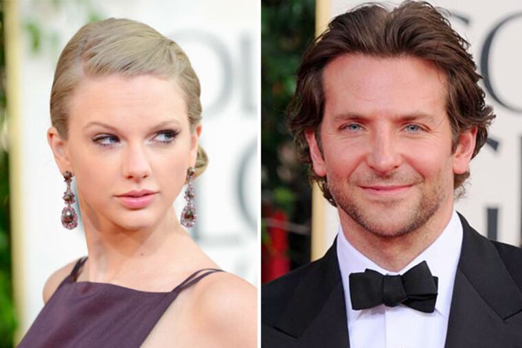 Taylor Swift, left, and Bradley Cooper at the 70th Annual Golden Globe Awards at the Beverly Hilton Hotel on Sunday Jan. 13, 2013, in Beverly Hills, Calif. (Photo by Jordan Strauss/Invision/AP)
