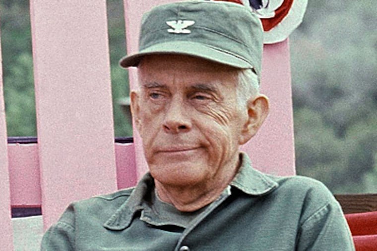 In this Sept. 19, 1982 photo, Actor Harry Morgan sits on the set of "M*A*S*H*" in Los Angeles.