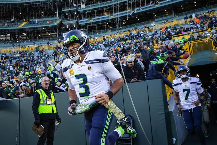 Seattle quarterback Russell Wilson take the field for a game against the Green Bay Packers on Sunday, Nov. 14.