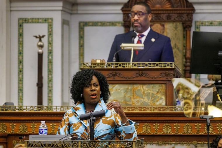 Philadelphia Mayor Cherelle L. Parker start to make her budget presentation to City Council in Council Chambers on Thursday, March 12, 2026. In the background is Council President Kenyatta Johnson.