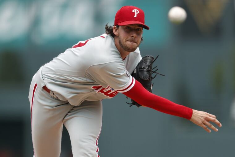 Phillies starter Aaron Nola held the Rockies to six hits and two runs in seven innings.