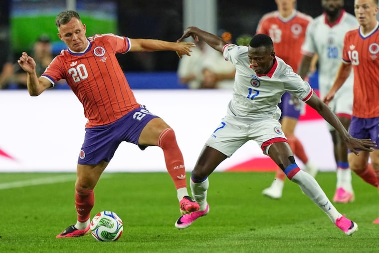 The Union's Danley Jean Jacques (right) in action for Haiti against Scotland on Saturday night in Foxborough, Mass.