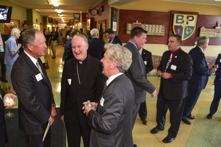 Celebrating the 5th anniversary of Faith in the Future Foundation’s management of Archdiocese high schools. are (from left) Ed Hanway, chairman of the foundation board; Rev. Michael J. Fitzgerald, auxilary Bishop of Education; and Samuel Casey Carter CEO of the foundation, at a reception and program at Monsignor Bonner & Archbishop Prendergast High School on Sept. 18. CLEM MURRAY / Staff Photographer