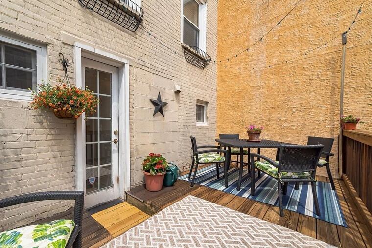 The Fitler Square townhouse has two exterior spaces, including a comfortable deck.