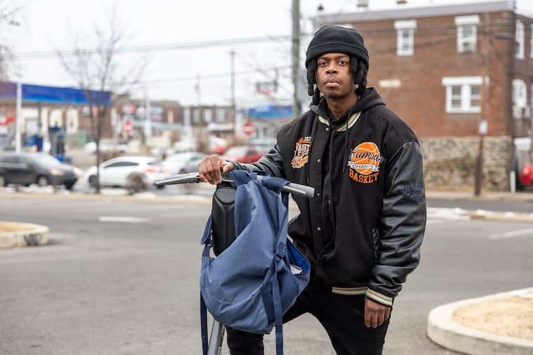 Saladine Sherrod, 34, of North Philadelphia, Pa., poses for a photo with his electric scooter in Philadelphia, Pa., on Wednesday, Feb. 18, 2026.